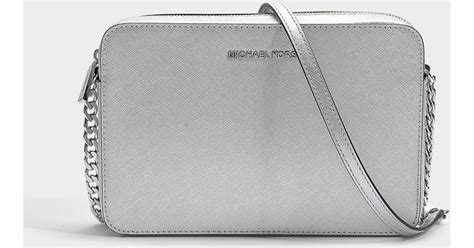 michael kors crossbody silver hardware|silver crossbody bag.